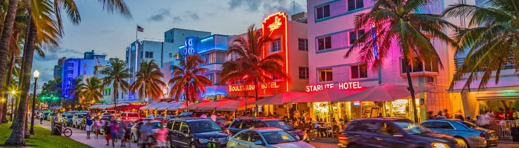 Neon-lit Art Deco hotels along Ocean Drive in Miami Beach, Florida
